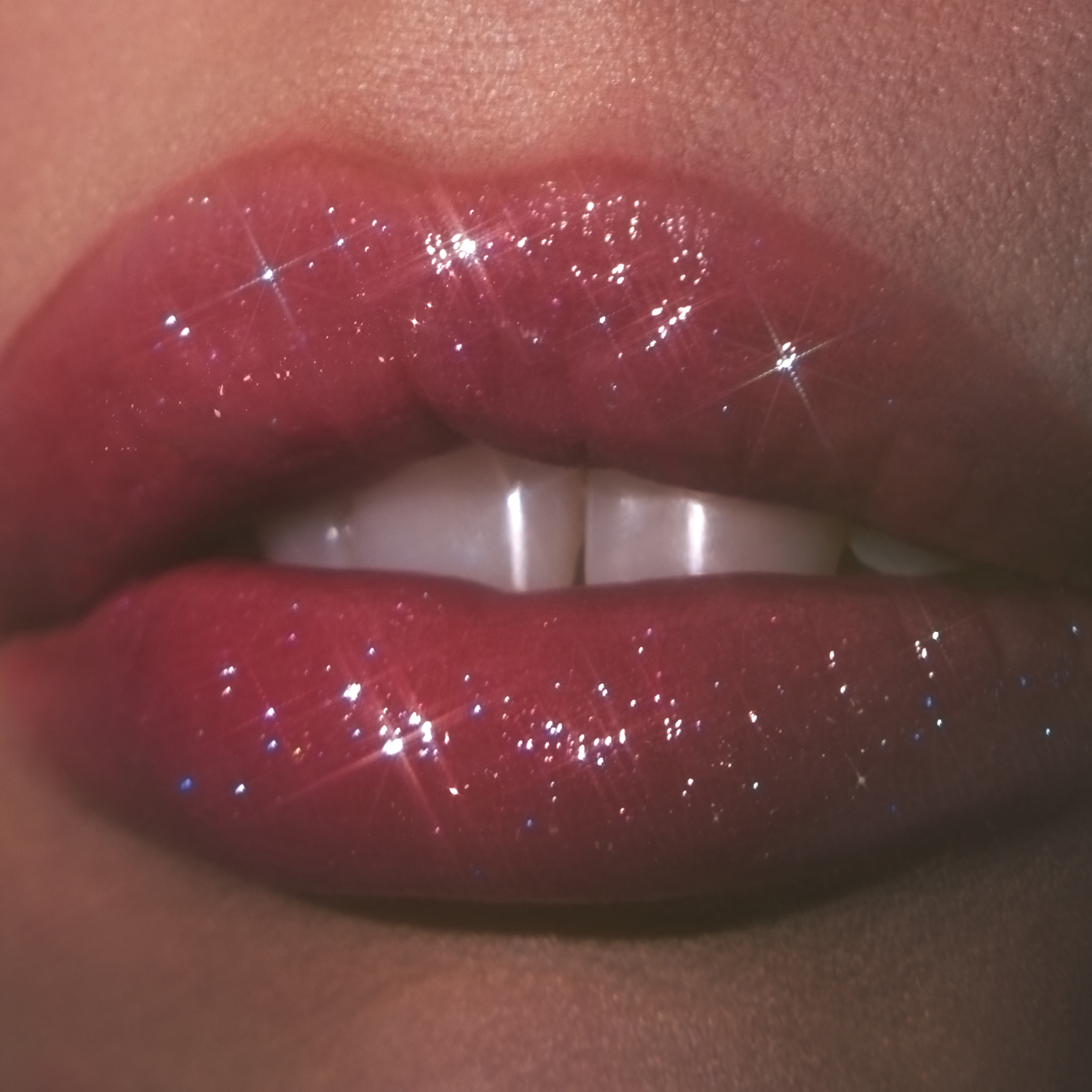 GLOW REVIVER LIP OIL GLIMMER (ACEITE LABIAL CON TINTE ACABADO BRILLOSO)